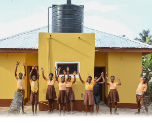 Ghanaian students outside a newly built washroom - Related Format