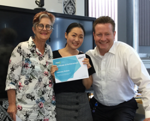 Teacher Lynley Ball, Student Ketty Sotana, Whittaker's CEO James Ardern 