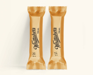 Two bars of chocolate in sustainable gold wrap